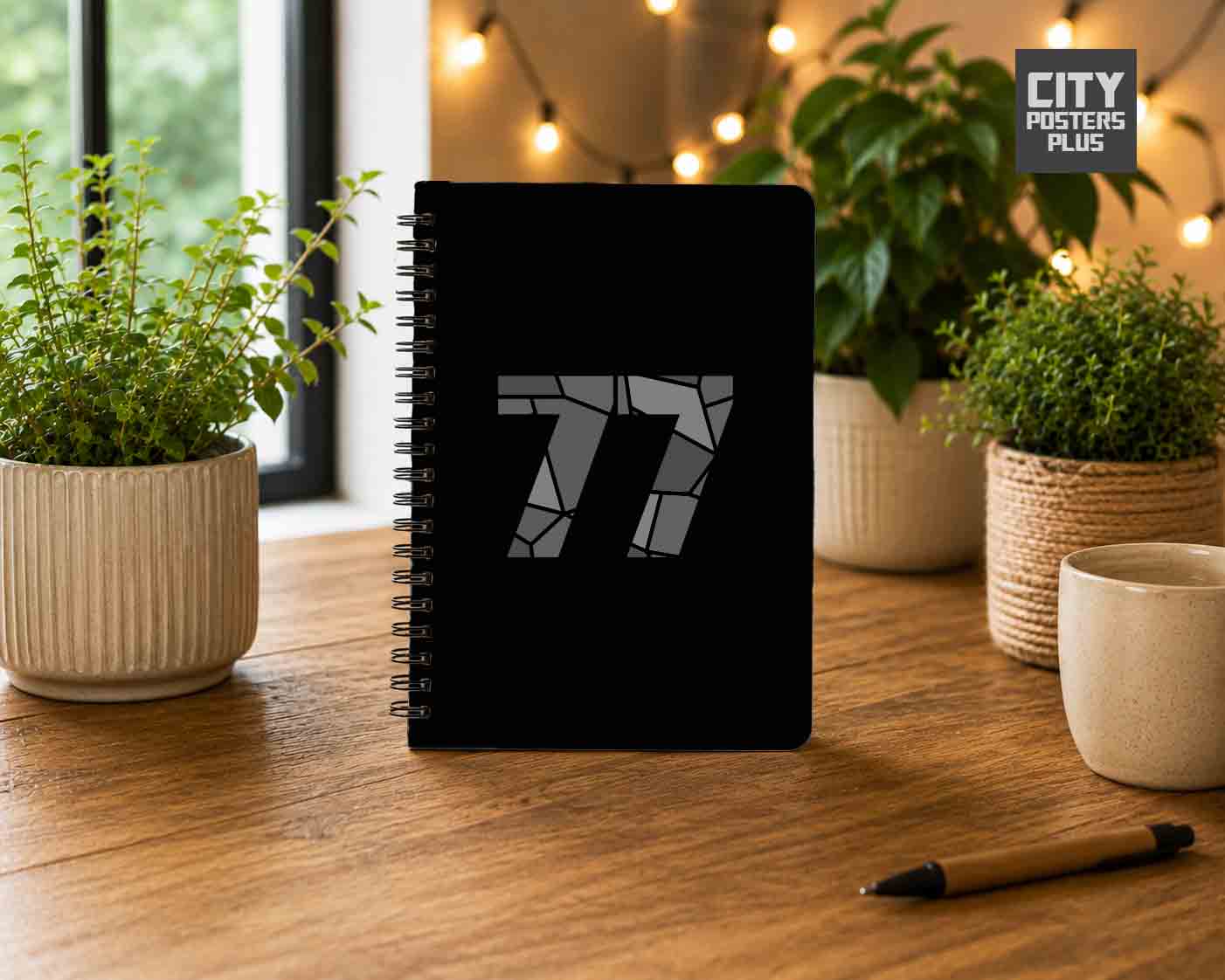 Notebook Plus One 77 Number Spiral Notebook (Black)